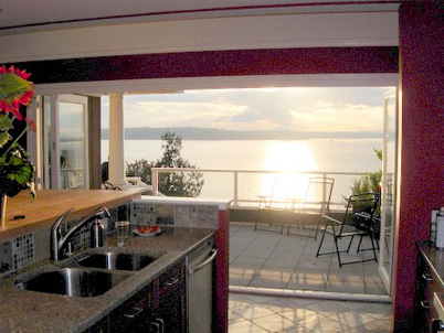 HH Windows and Doors, 4 panel fold-slide door, ocean view